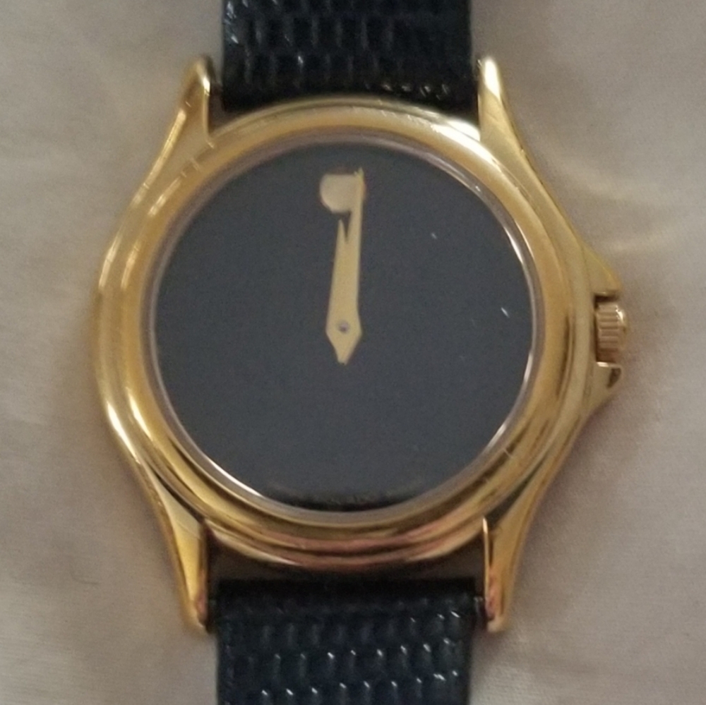 WOMANS MOVADO LEATHER WATCH